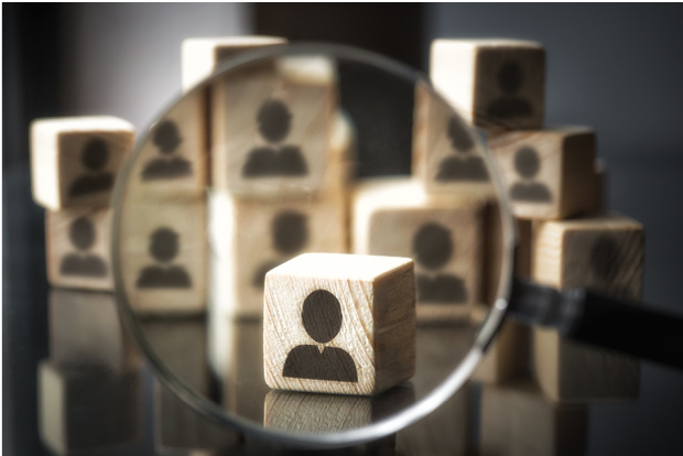 Magnifying glass on wooden blocks